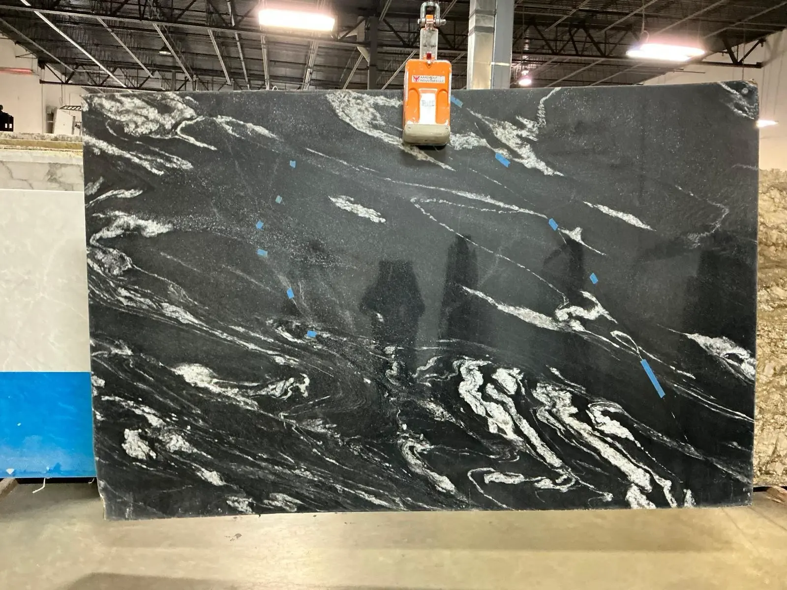 Black stone slab with white veining for bold countertop inspiration.