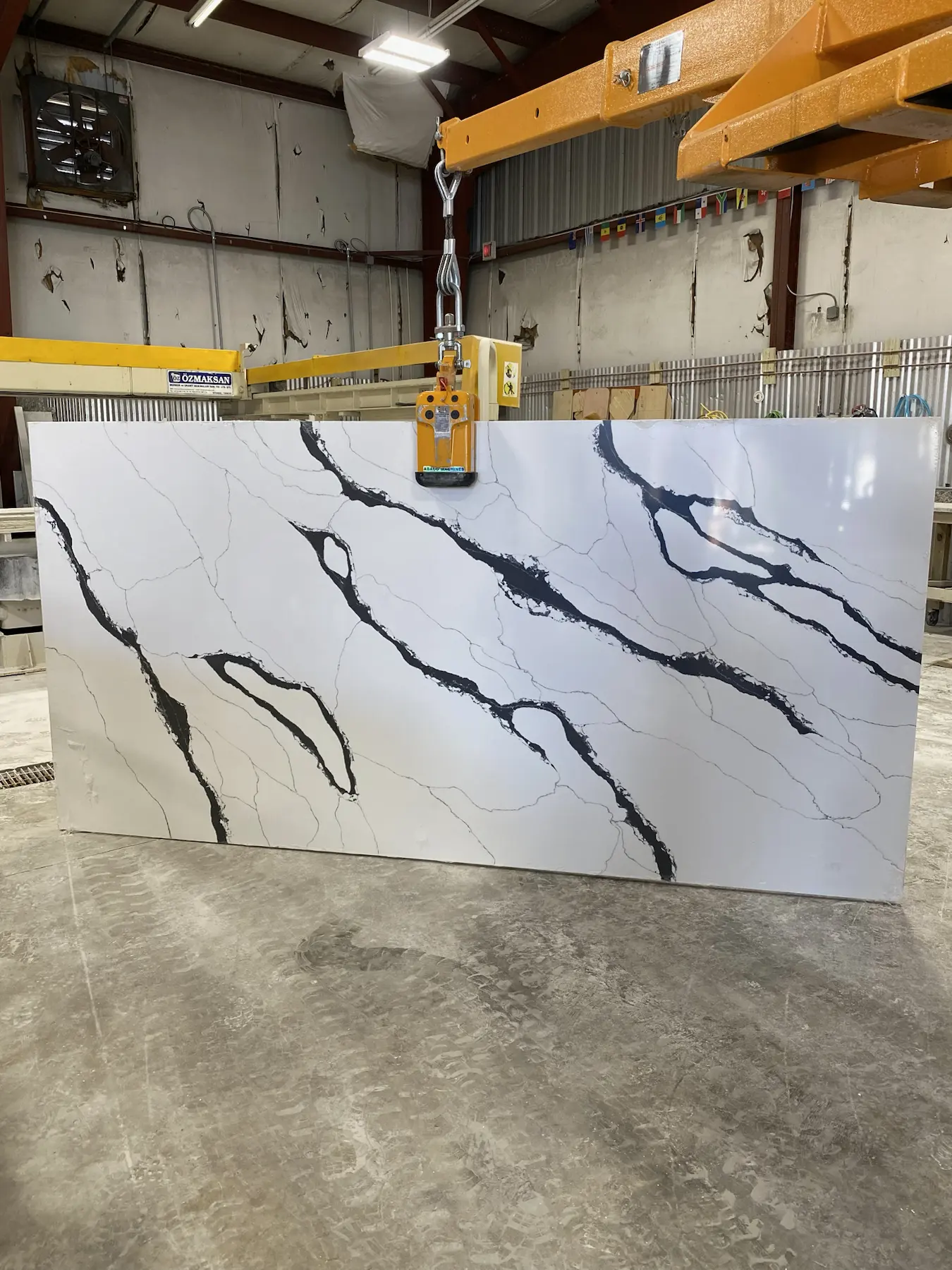 White stone slab with bold black veining for dramatic countertop inspiration.